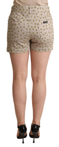 Shorts en denim stretch beige à pois Dolce & Gabbana, coton léger et confortable, mode élégante et décontractée.