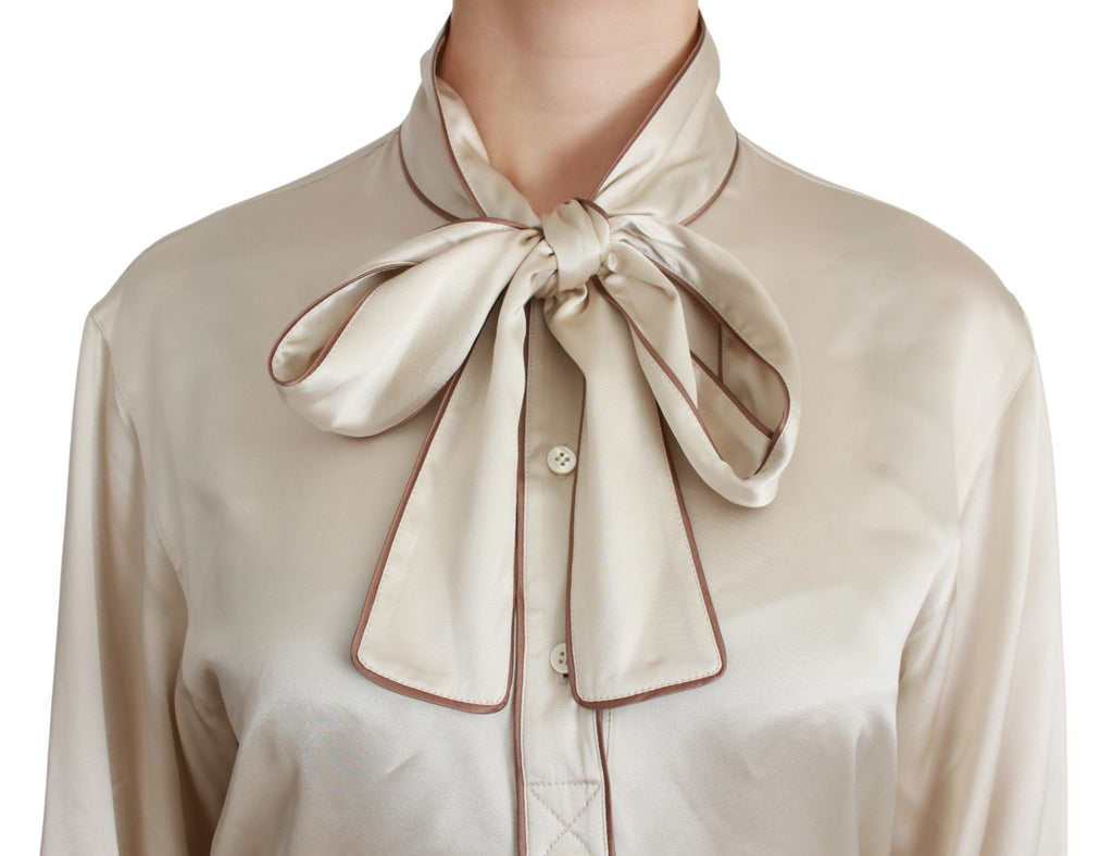 Haut en soie beige Dolce & Gabbana à manches longues, style blouse satin élégante pour femme.