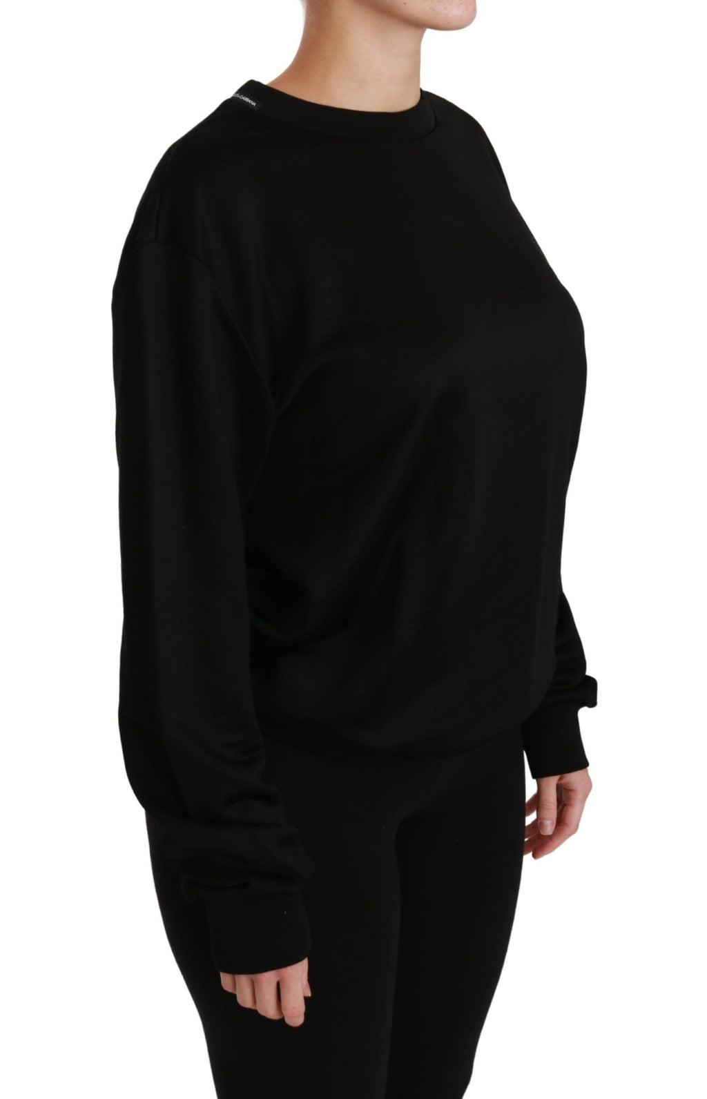 Pull-over noir en coton Dolce & Gabbana, col rond, style casual et élégant, visible sur l'image.