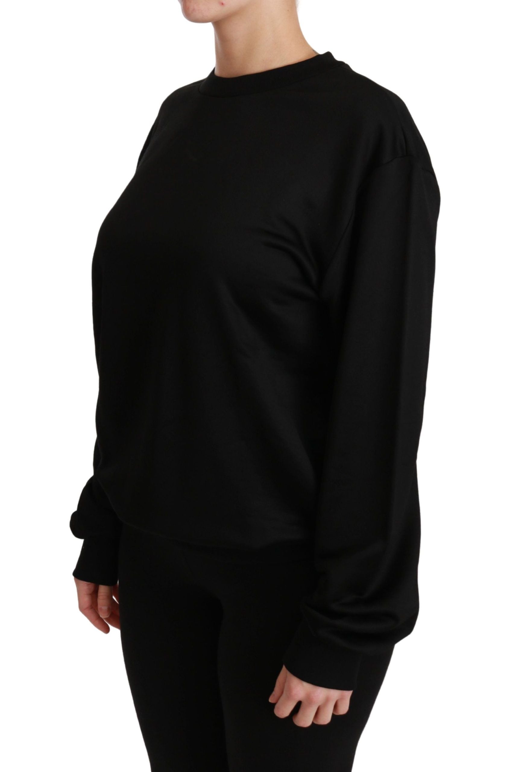 Pull-over noir en coton Dolce & Gabbana avec col rond, classique et confortable, visible sur cette image.