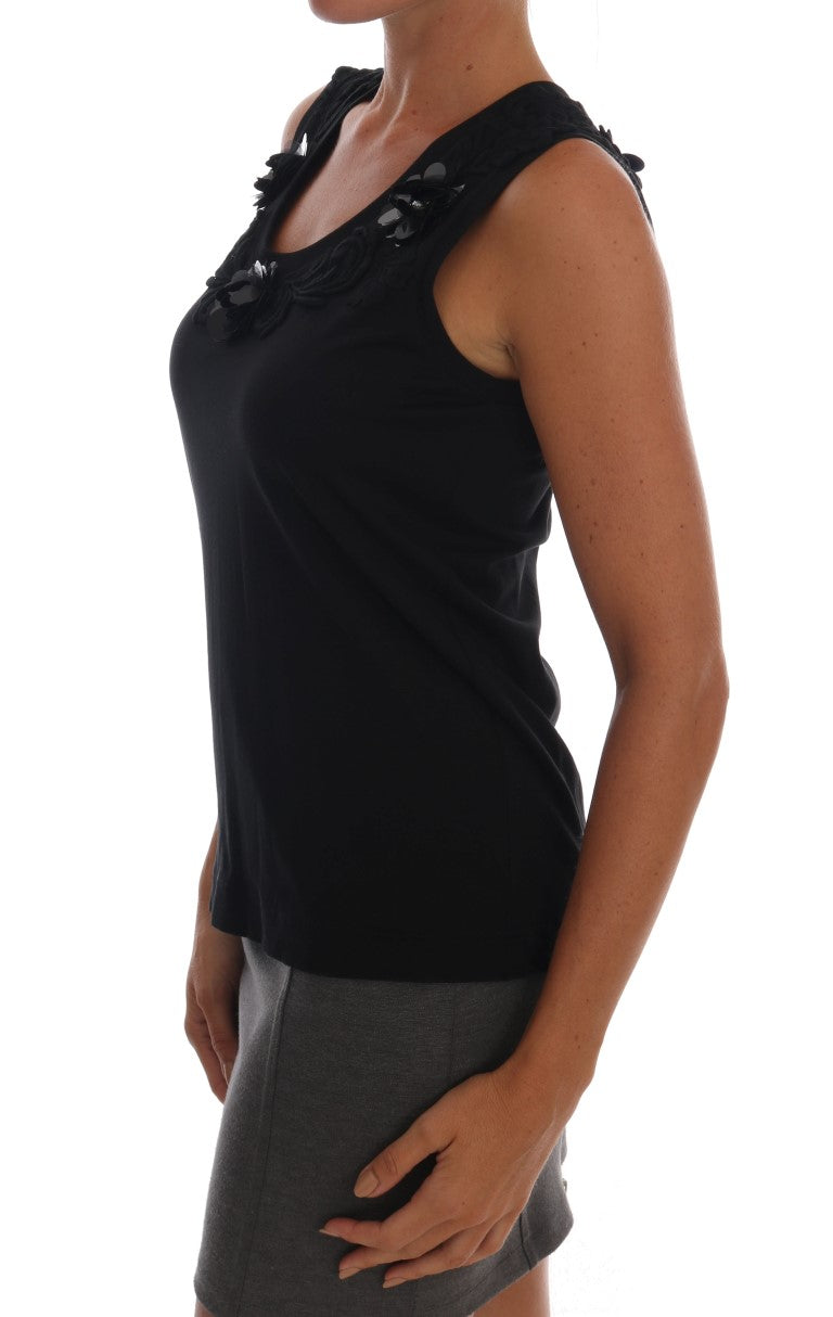 Débardeur noir en coton avec motifs floraux et cristaux de Dolce & Gabbana, visible détails du tissu et décoration brillante.