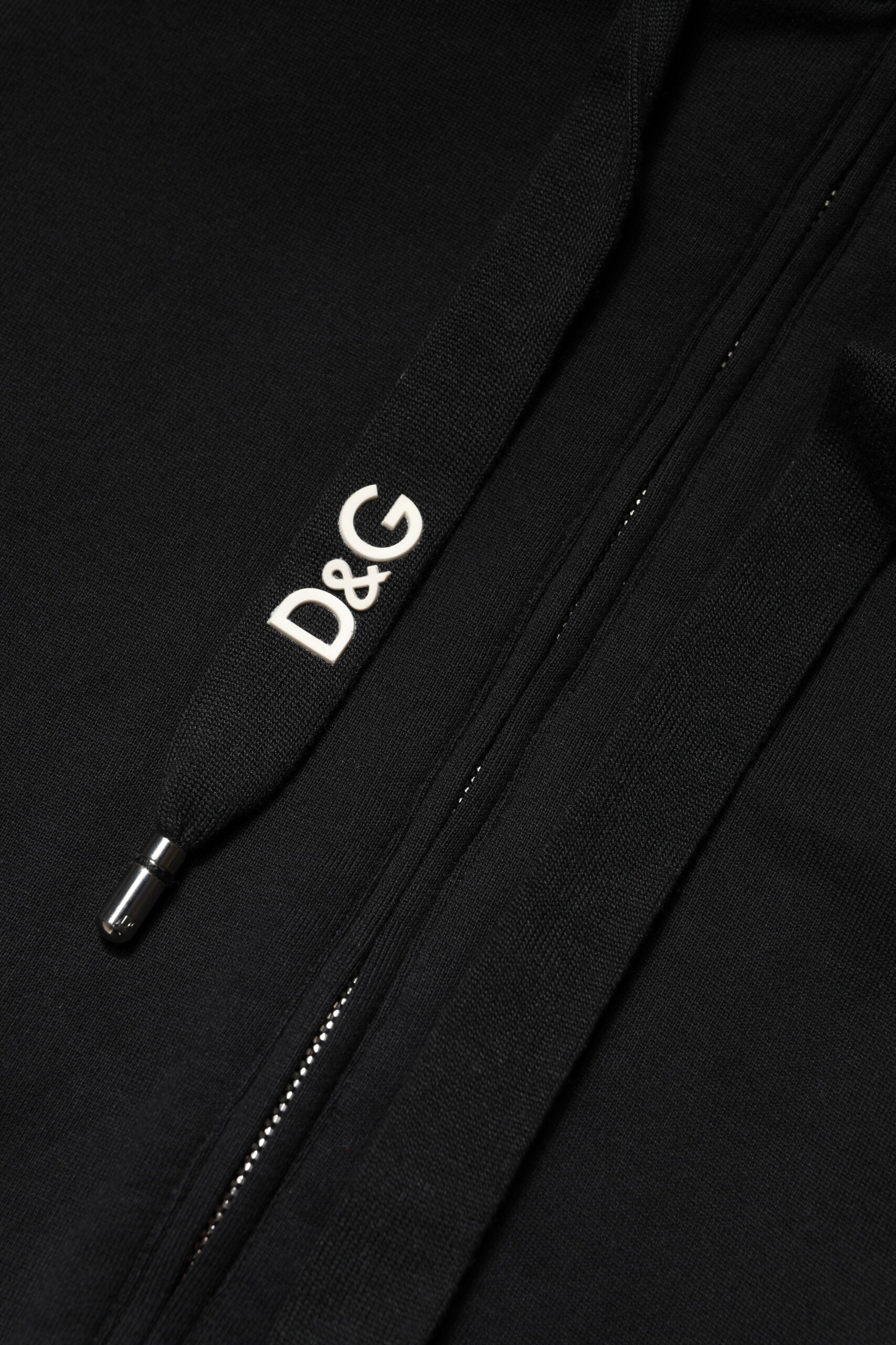 Sweatshirt à capuche zippé en coton noir de Dolce & Gabbana, pull décontracté avec fermeture éclair et logo discret.