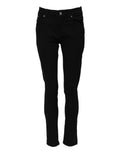 Jeans skinny en coton noir Dolce & Gabbana, logo, taille mi-haute, détails en denim, coupe ajustée visible sur l'image.