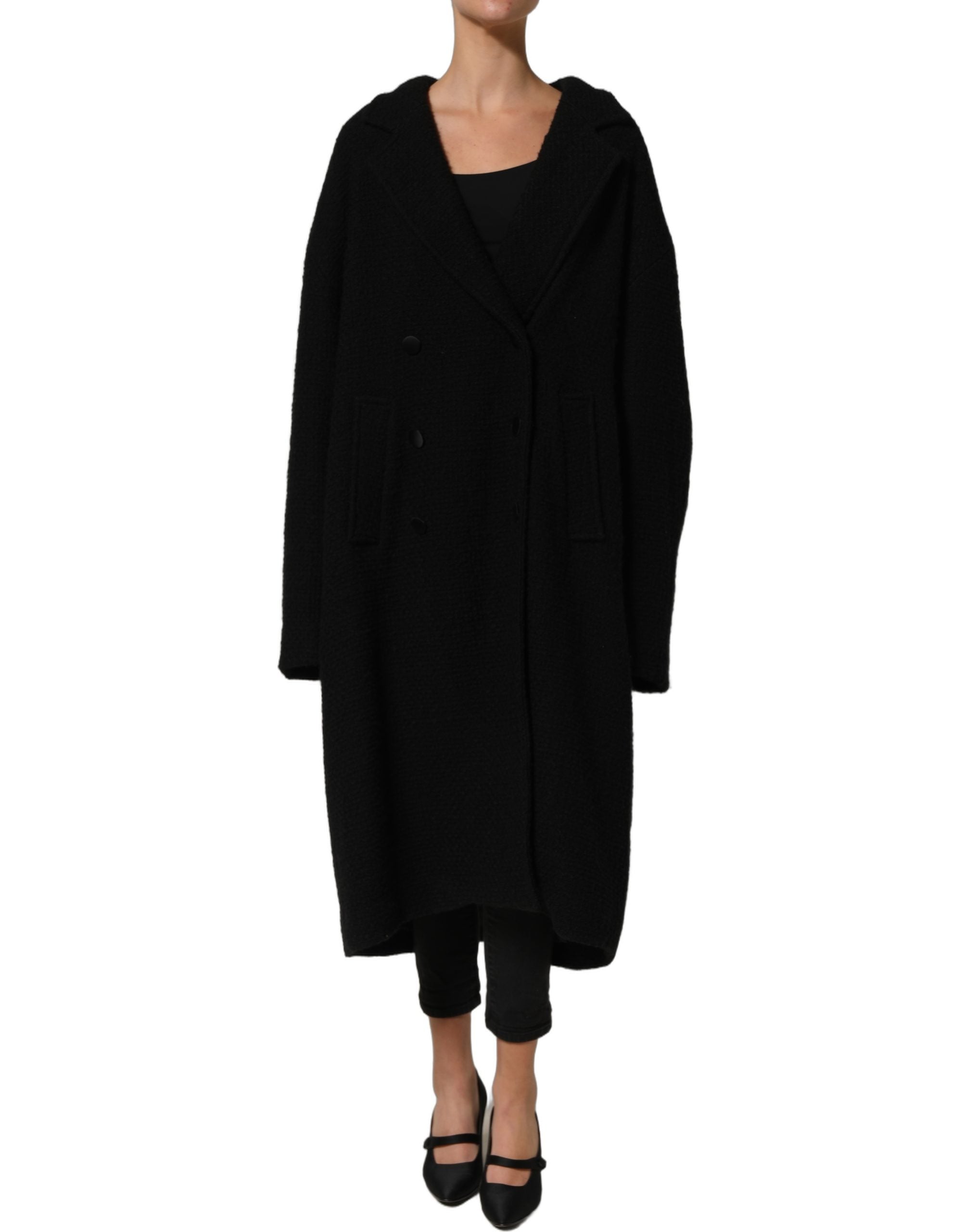 Manteau trench noir pour homme Dolce & Gabbana à double boutonnage, élégant et classique, porté sur un mannequin.