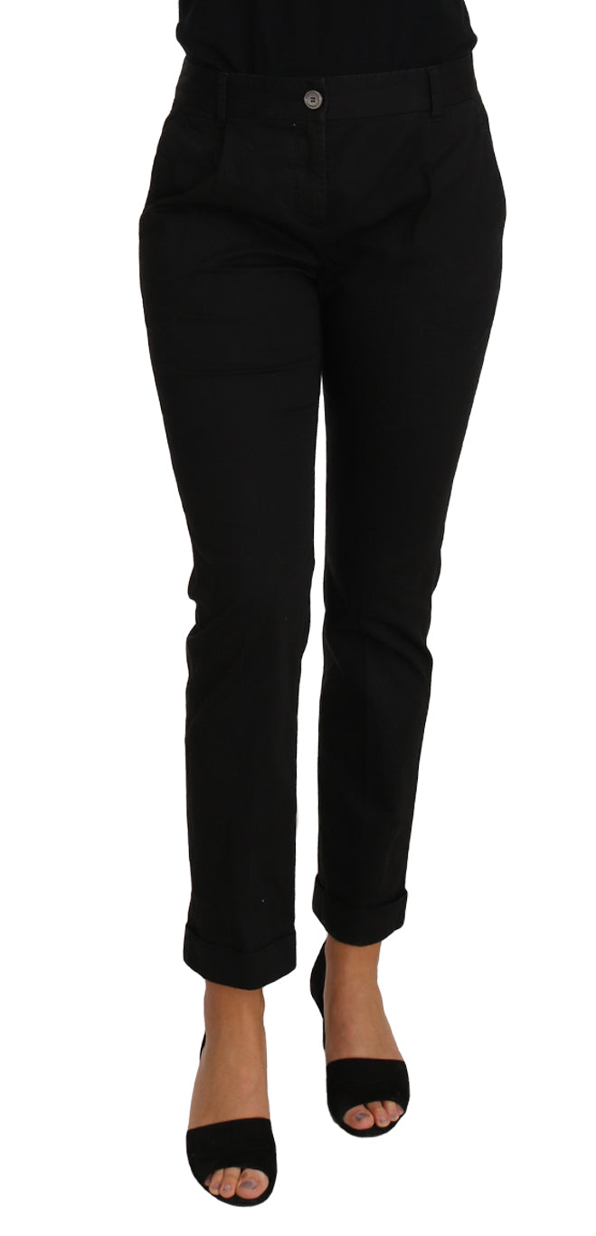 Robe noire Dolce & Gabbana avec pantalon cropped droit, style élégant et moderne, vue de face sur fond neutre.