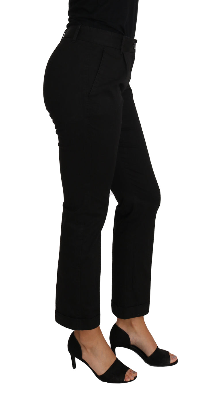 Robe noire Dolce & Gabbana avec pantalon cropped droit, style élégant et moderne, vue de devant sur mannequin.