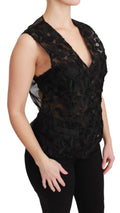 Gilet Dolce & Gabbana en brocard noir avec motif floral, veste cintrée élégante pour femme.