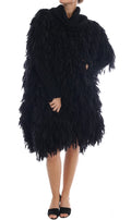 Pull en laine noir Dolce & Gabbana avec franges, style décontracté et élégant, visible avec détails de franges sur le devant.