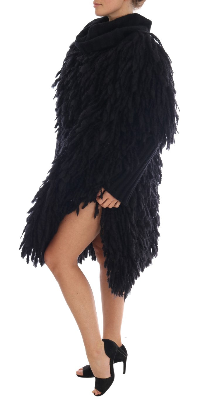 Pull en laine noir Dolce & Gabbana avec franges, détail texturé et style élégant visible sur l'image.
