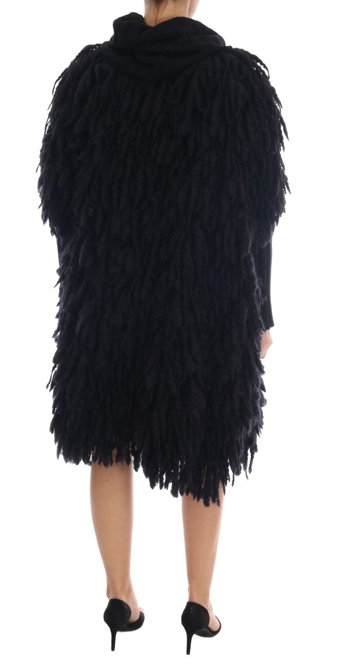 Pull en laine noir Dolce & Gabbana avec franges, vue de face, mettant en valeur le design élégant et les détails du pull.