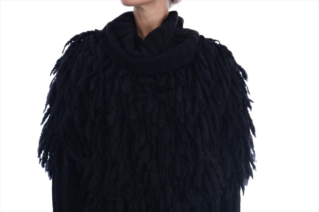 Pull en laine noir à franges de Dolce & Gabbana, pull-over élégant avec détails en franges sur le devant.