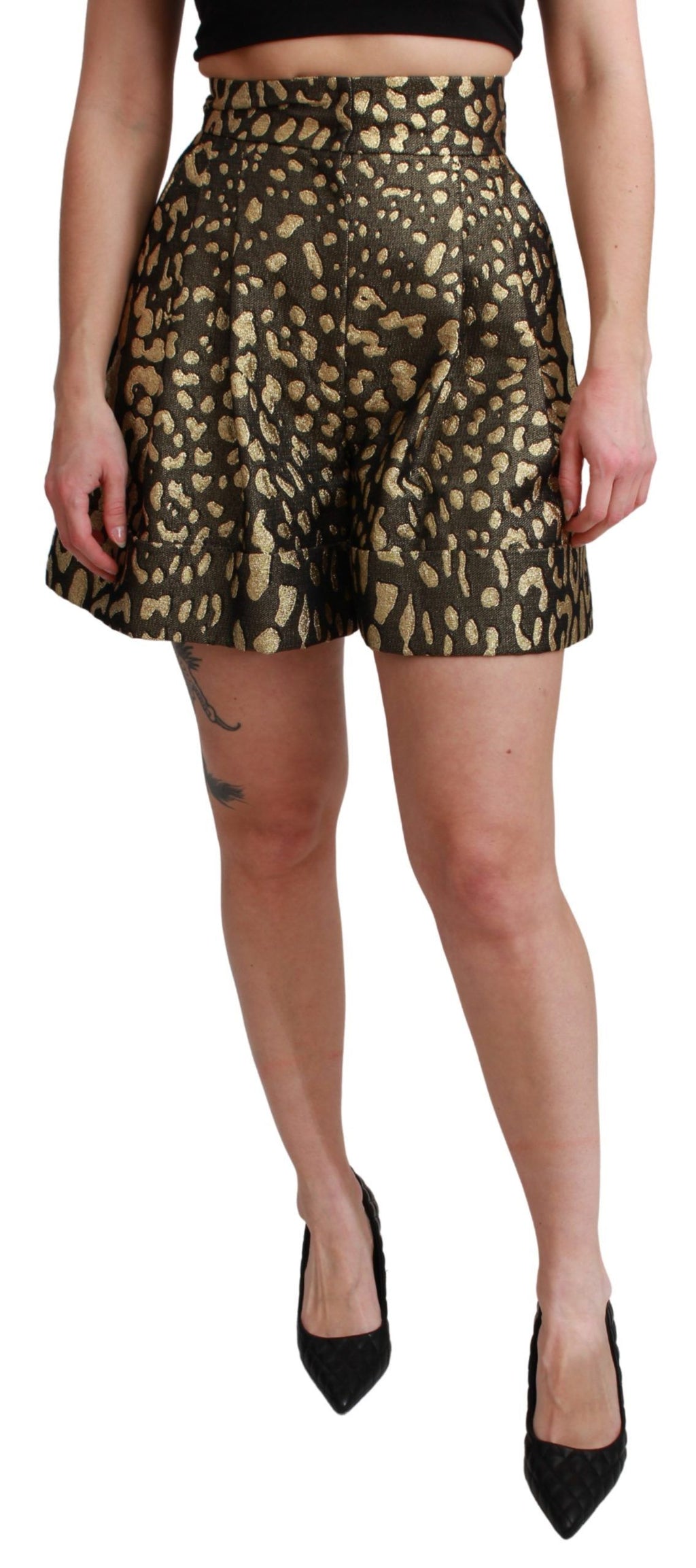 Shorts en coton noire et or de haute taille de Dolce & Gabbana, avec détails élégants et finition raffinée.