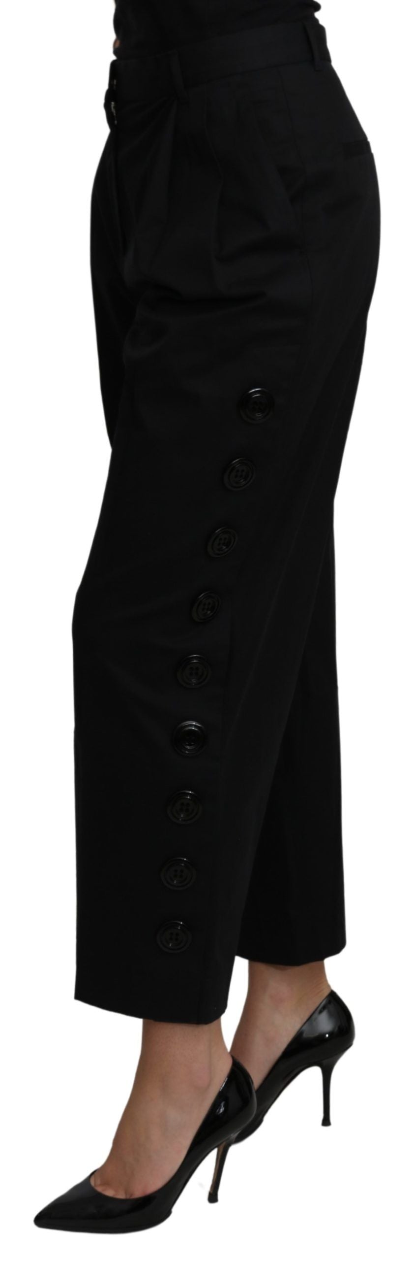 Pantalons cropped en coton extensible noir à taille haute de Dolce & Gabbana, vue de face sur fond blanc