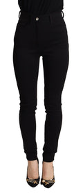 Pantalon noir taille haute skinny Dolce & Gabbana en tissu stretch, ajusté et élégant, visible sur fond neutre.