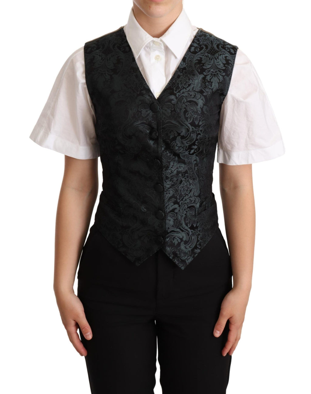 Gilet en jacquard floral noir de Dolce & Gabbana, coupe ajustée, avec détails verts, porté sur fond neutre.