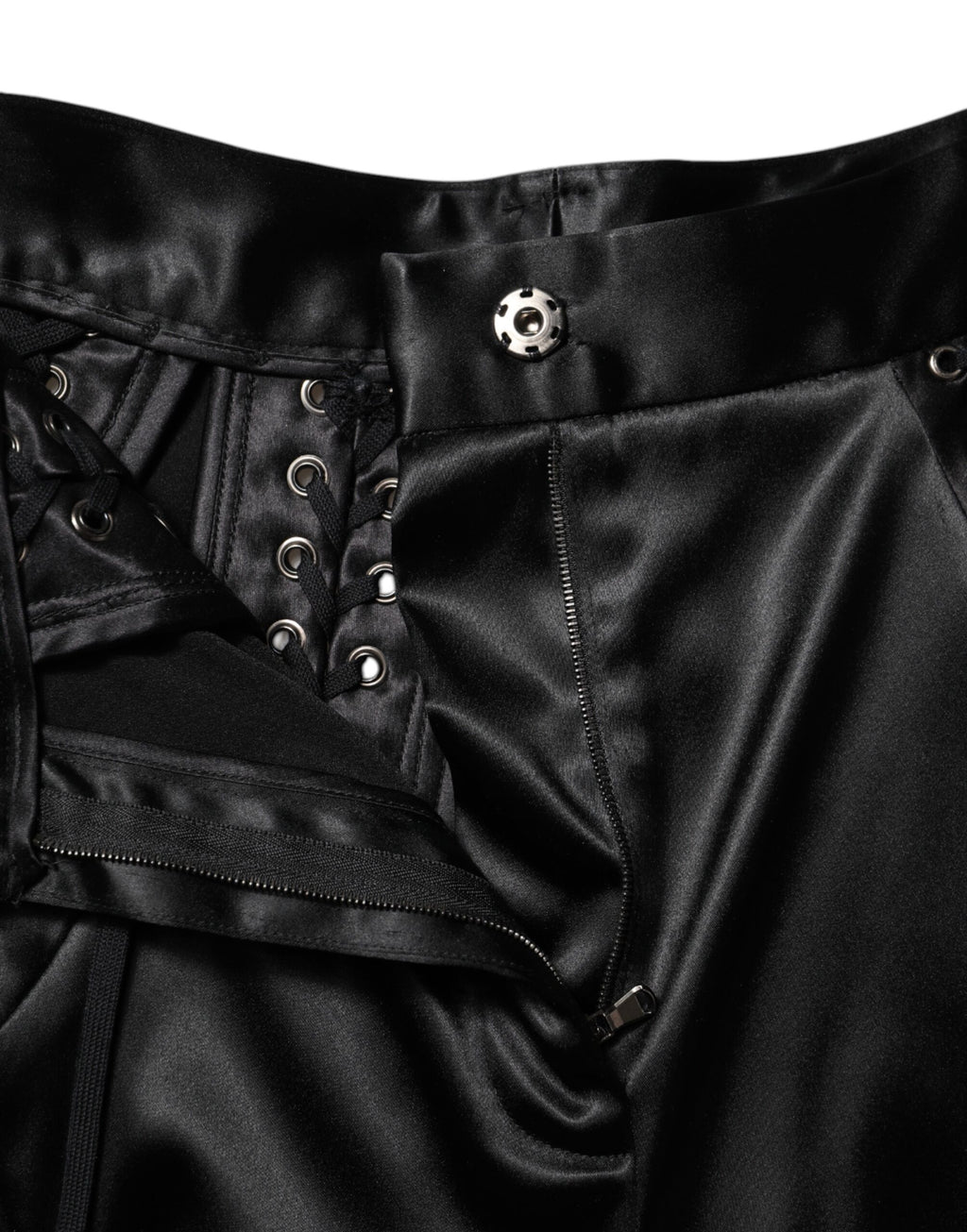 Pantalons skinny noirs Dolce & Gabbana avec détails en dentelle à la taille haute, ajustés et élégants.