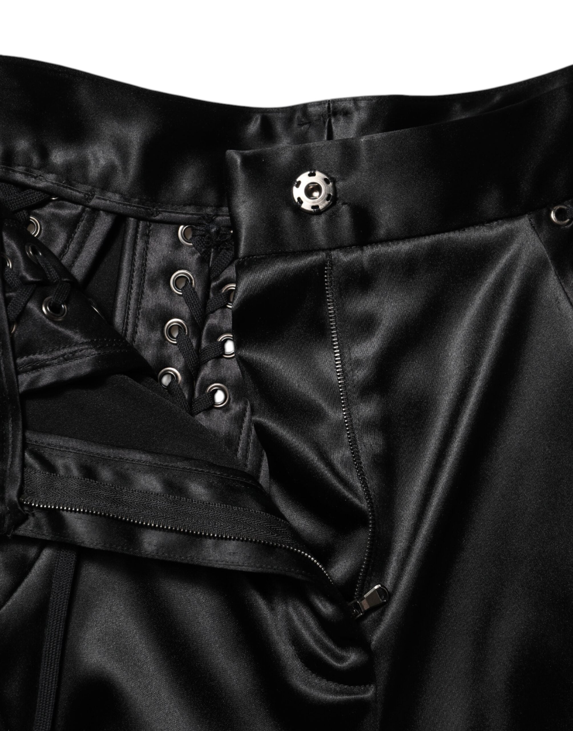 Pantalons skinny noirs Dolce & Gabbana avec détails en dentelle à la taille haute, ajustés et élégants.