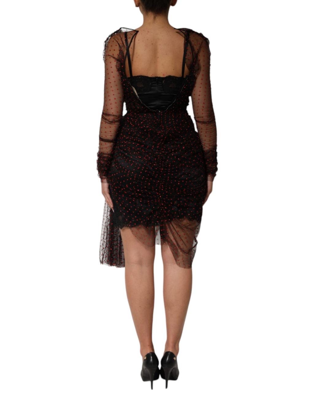 Robe courte en dentelle noire Dolce & Gabbana à manches longues et coupe ajustée, élégante et sophistiquée.