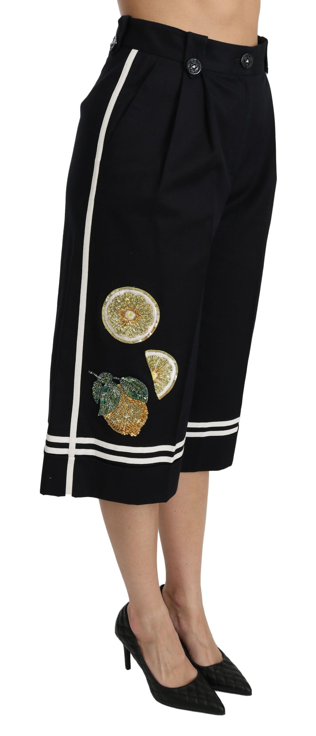 Pantalon palazzo noir Dolce & Gabbana avec embellissements de citron, coupe cropped, style élégant et contemporain.