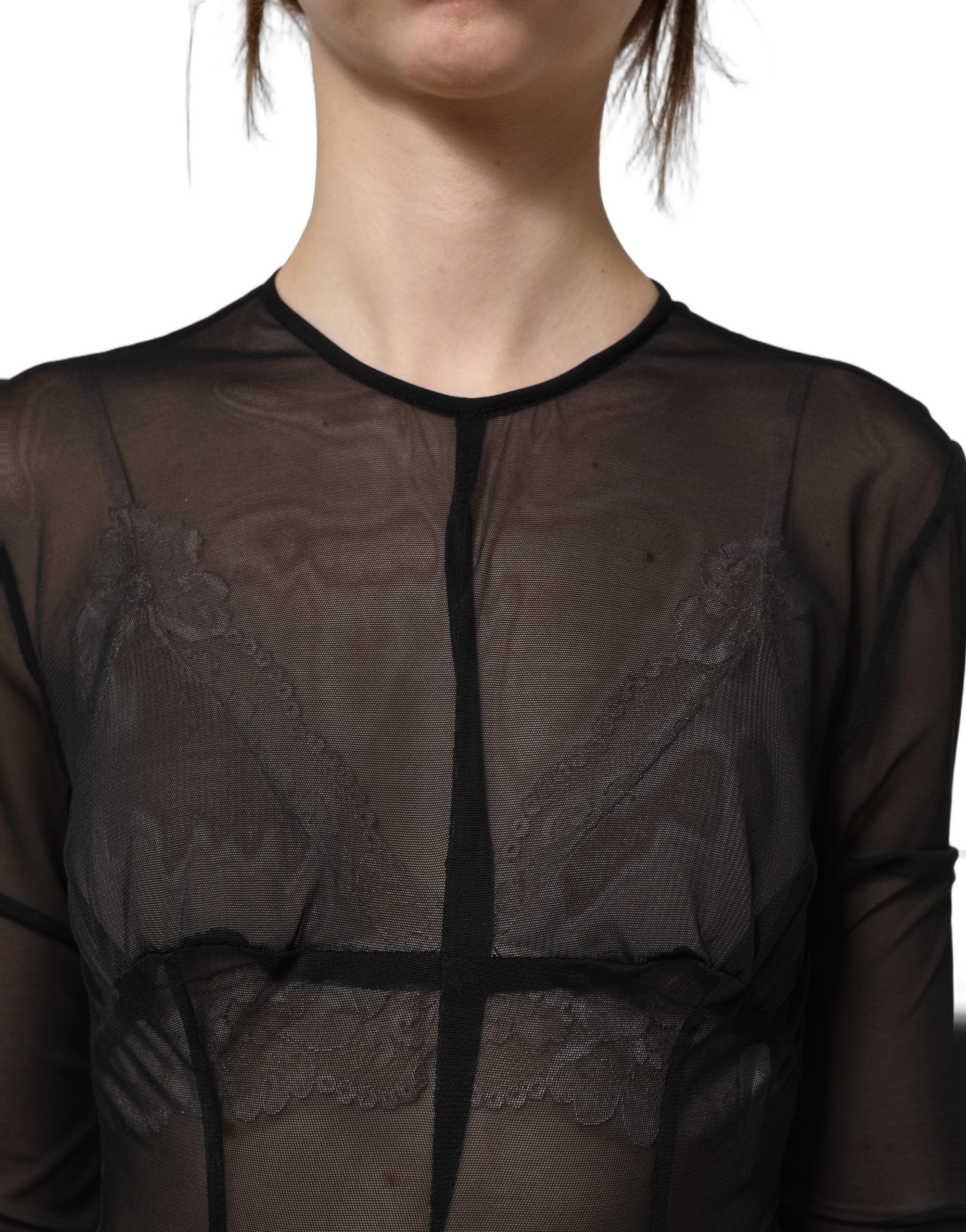 Robe longue noire Dolce & Gabbana en dentelle transparente, ajustée, à manches longues et style maxi élégante.
