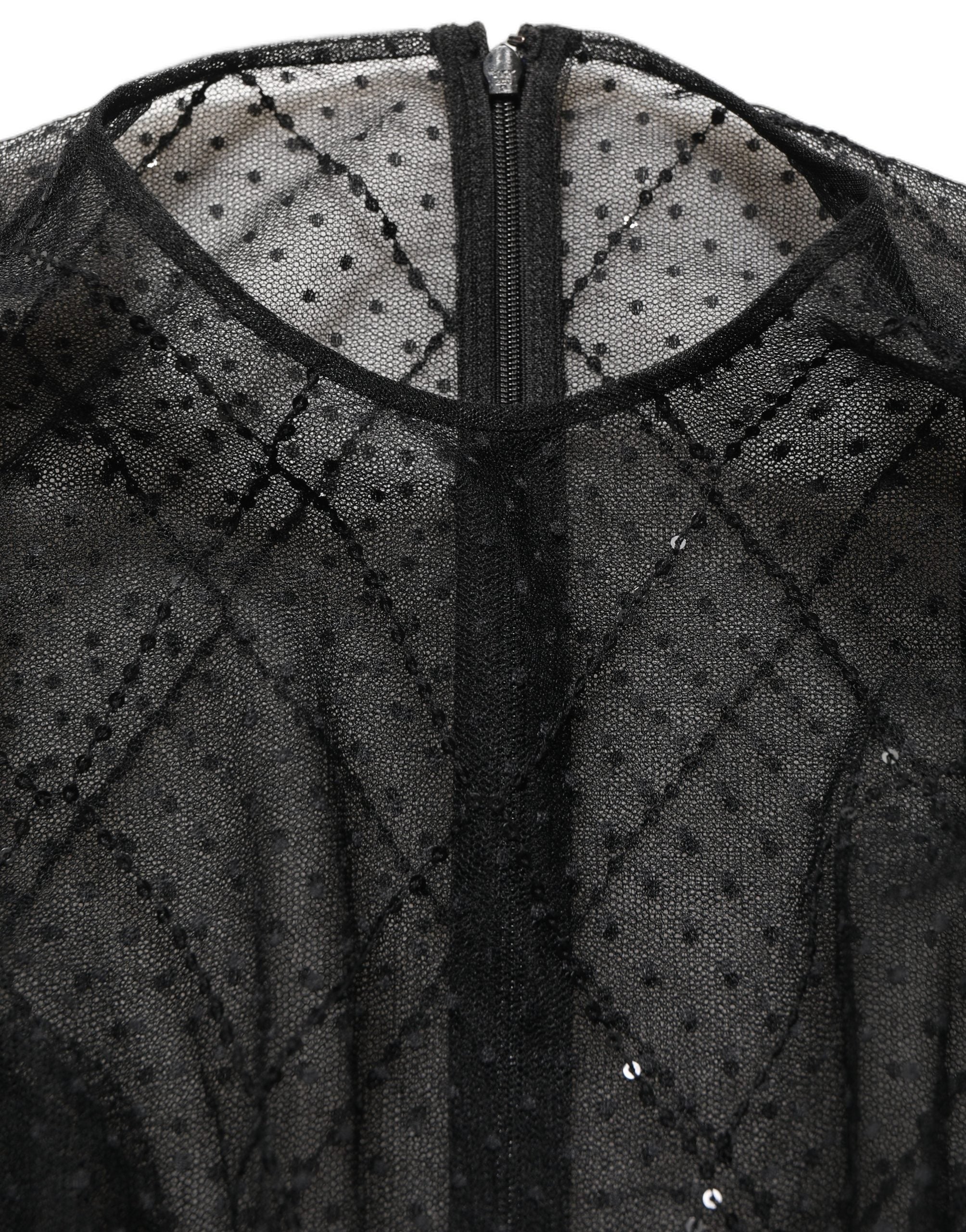 Robe longue noire en dentelle et mesh de Dolce & Gabbana, vêtement élégant à manches longues et style maxi.