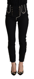 Pantalons slim noir Dolce & Gabbana à taille moyenne, boutons décoratifs et finition élégante.