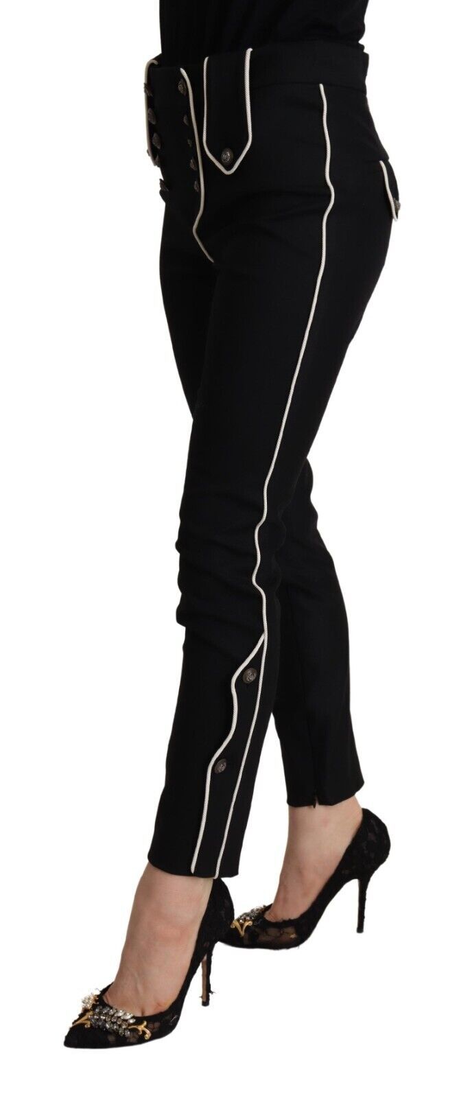Pantalon slim noir Dolce & Gabbana à taille moyenne, boutons décoratifs et ajustement moulant visible sur l'image.