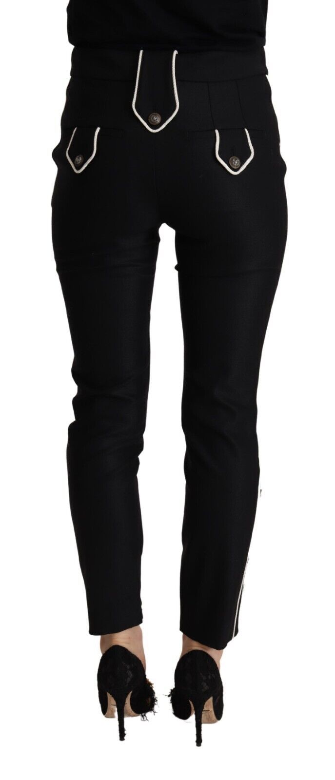 Pantalon slim noir Dolce & Gabbana à taille moyenne, boutons décoratifs et coupe ajustée, visible en gros plan.
