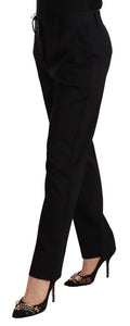 Pantalon en laine noir Dolce & Gabbana, pantalon skinny taille moyenne, coupe ajustée et élégante.