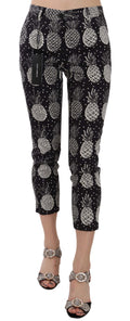 Pantalons capri skinny Dolce & Gabbana en tissu noir avec imprimé ananas, coupe ajustée et style tendance.