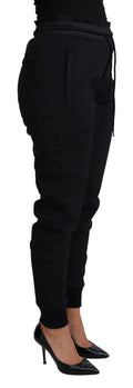 Pantalon jogger noir en polyester et néoprène de Dolce & Gabbana, style décontracté et moderne.