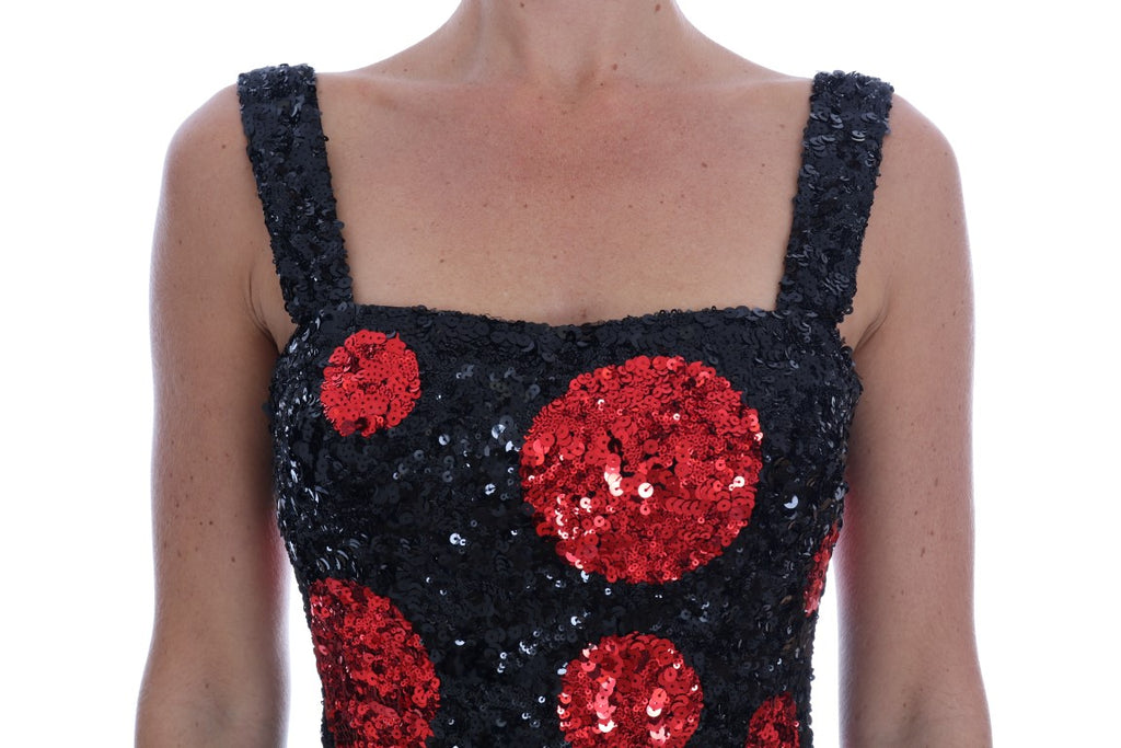Robe droite Dolce & Gabbana à pois rouges et noirs avec sequins, style élégant et festif.