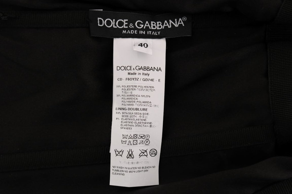 Robe droite Dolce & Gabbana noire et rouge à pois sequins, élégante et sophistiquée, vue de face.