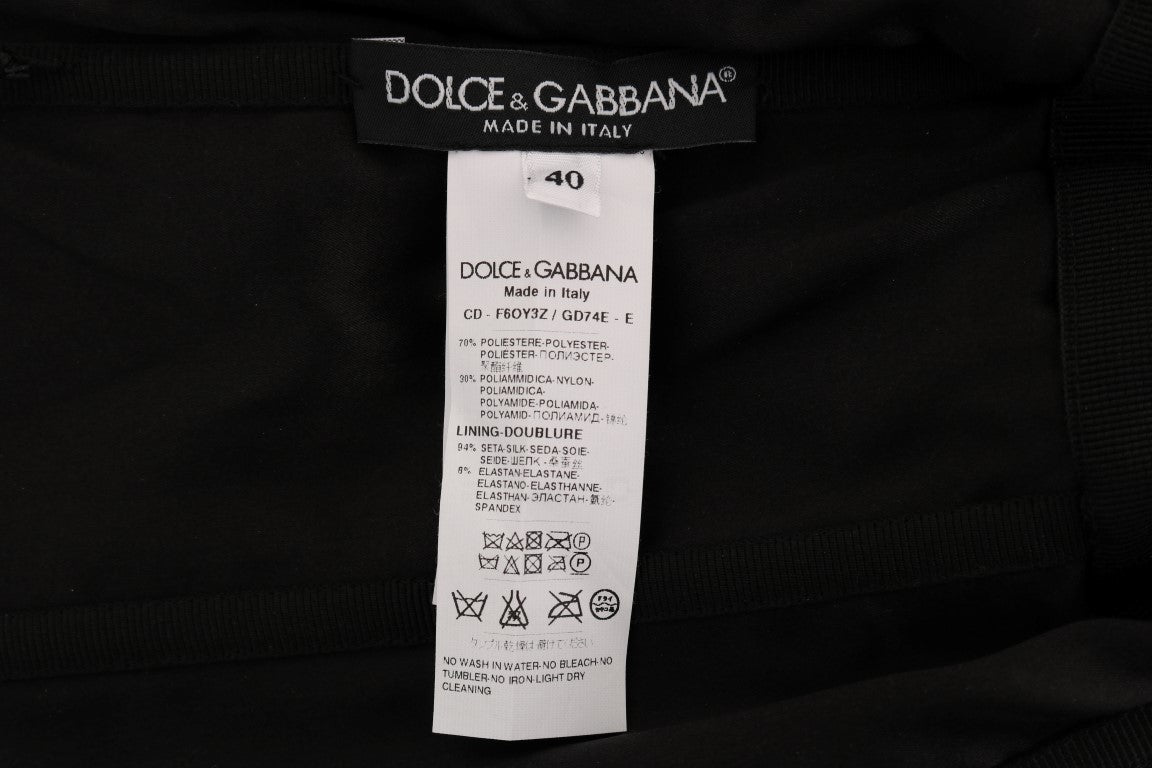 Robe droite Dolce & Gabbana noire et rouge à pois sequins, élégante et sophistiquée, vue de face.