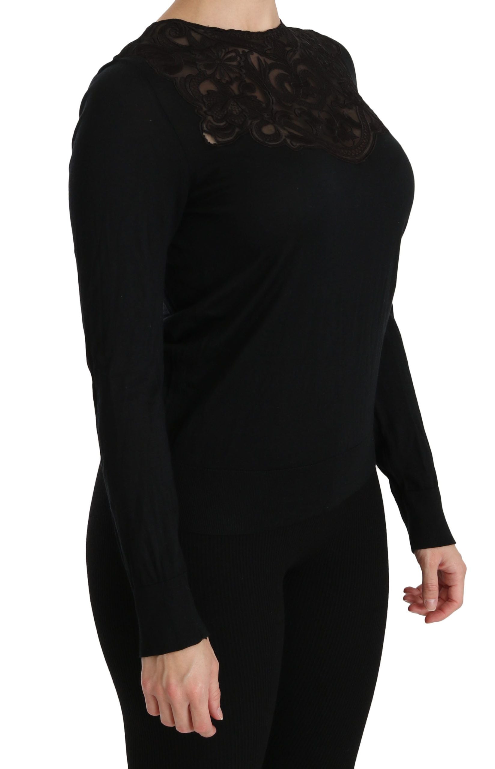 Blouse en soie noire Dolce & Gabbana avec dentelle, col rond et manches longues, élégante et sophistiquée.