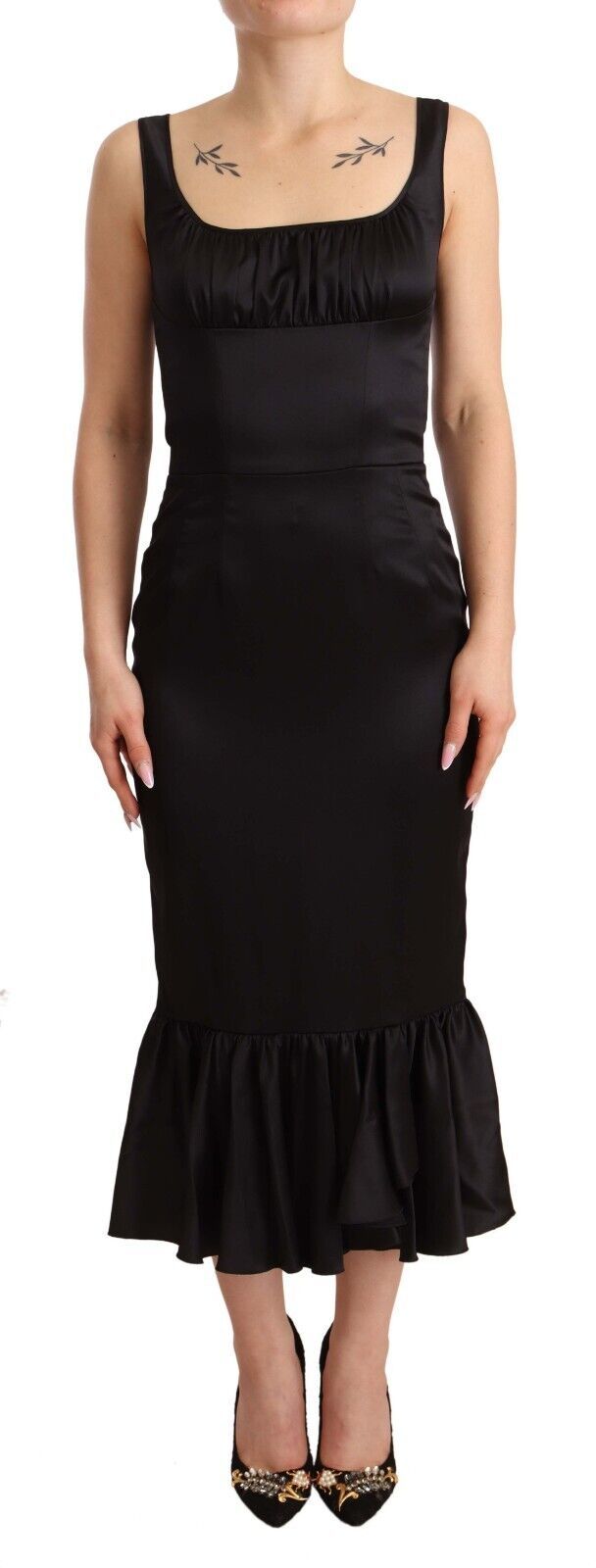 Robe sirène midi en soie noire stretch de Dolce & Gabbana, ajustée et élégante, vue de face sur fond neutre.