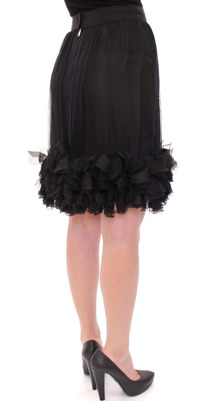 Jupe transparente en soie noire Dolce & Gabbana au-dessus du genou, élégante et sophistiquée, vue de face.