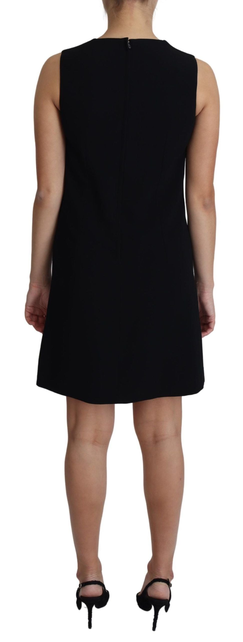 Robe courte noire en viscose stretch de style trapèze, marque Dolce & Gabbana, avec coupe élégante et silhouette fluide.