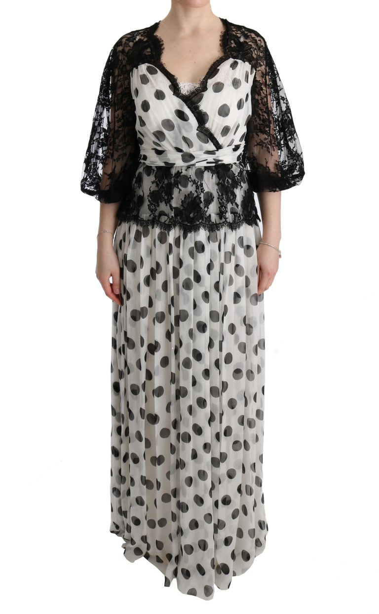 Robe noire et blanche à pois et fleurs de Dolce & Gabbana, style élégant avec motif floral et pois.