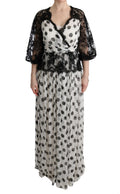 Robe noire et blanche à pois et fleurs de Dolce & Gabbana, style élégant avec motif floral et pois.
