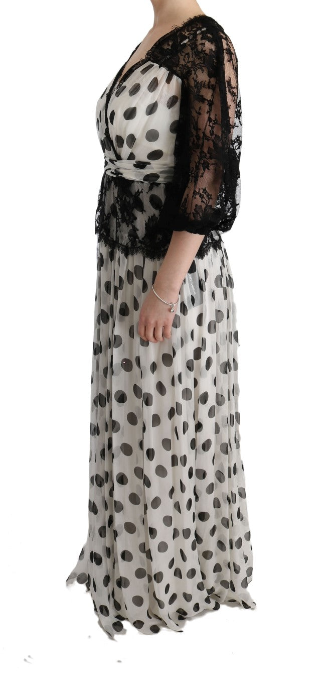 Robe fleurie à pois noirs et blancs de Dolce & Gabbana, robe élégante en tissu léger avec motif floral.