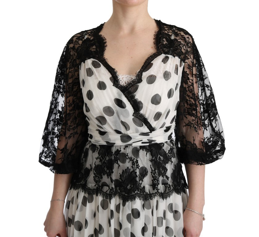 Robe noire et blanche à pois avec motifs floraux de Dolce & Gabbana, robe élégante à manches longues.