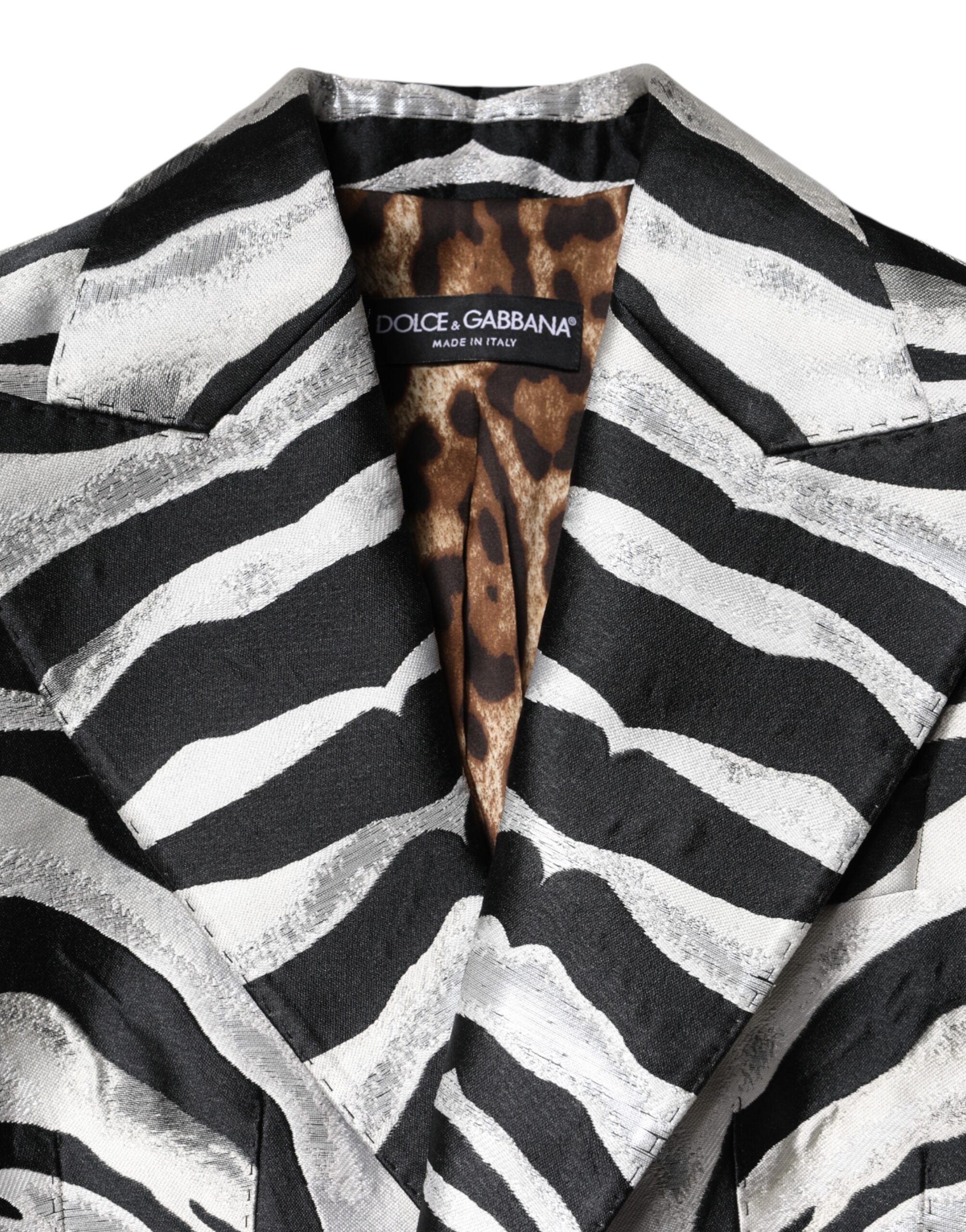 Blazer pour femmes Dolce & Gabbana noir et blanc en polyester, élégant et moderne, porté sur un mannequin.