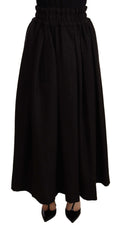 Jupe longue maxi en laine noire Dolce & Gabbana à taille haute, détails élégants et coupe fluide.
