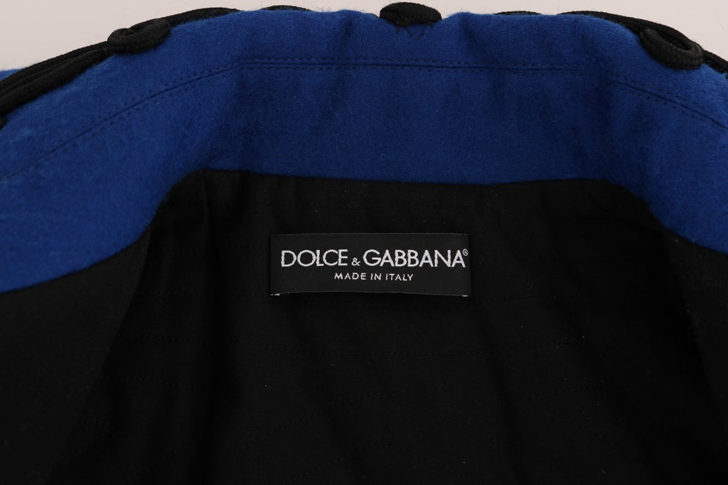 Veste trench en laine noire de Dolce & Gabbana, coupe élégante avec ceinture et détails sophistiqués.