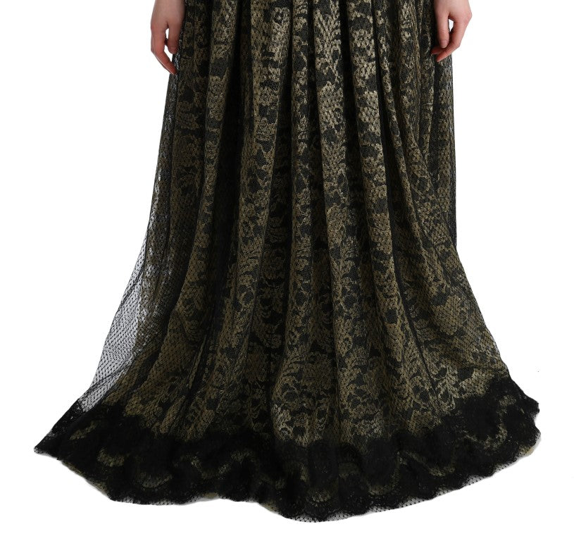 Robe Dolce & Gabbana noire et jaune en dentelle avec cristaux, coupe shift élégante et sophistiquée.