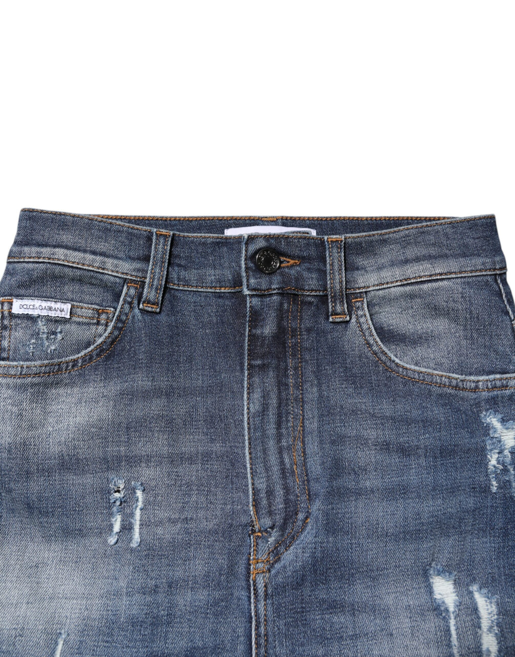 Jeans skinny en denim coton bleu à taille haute de Dolce & Gabbana, vue en gros plan devant un fond neutre.