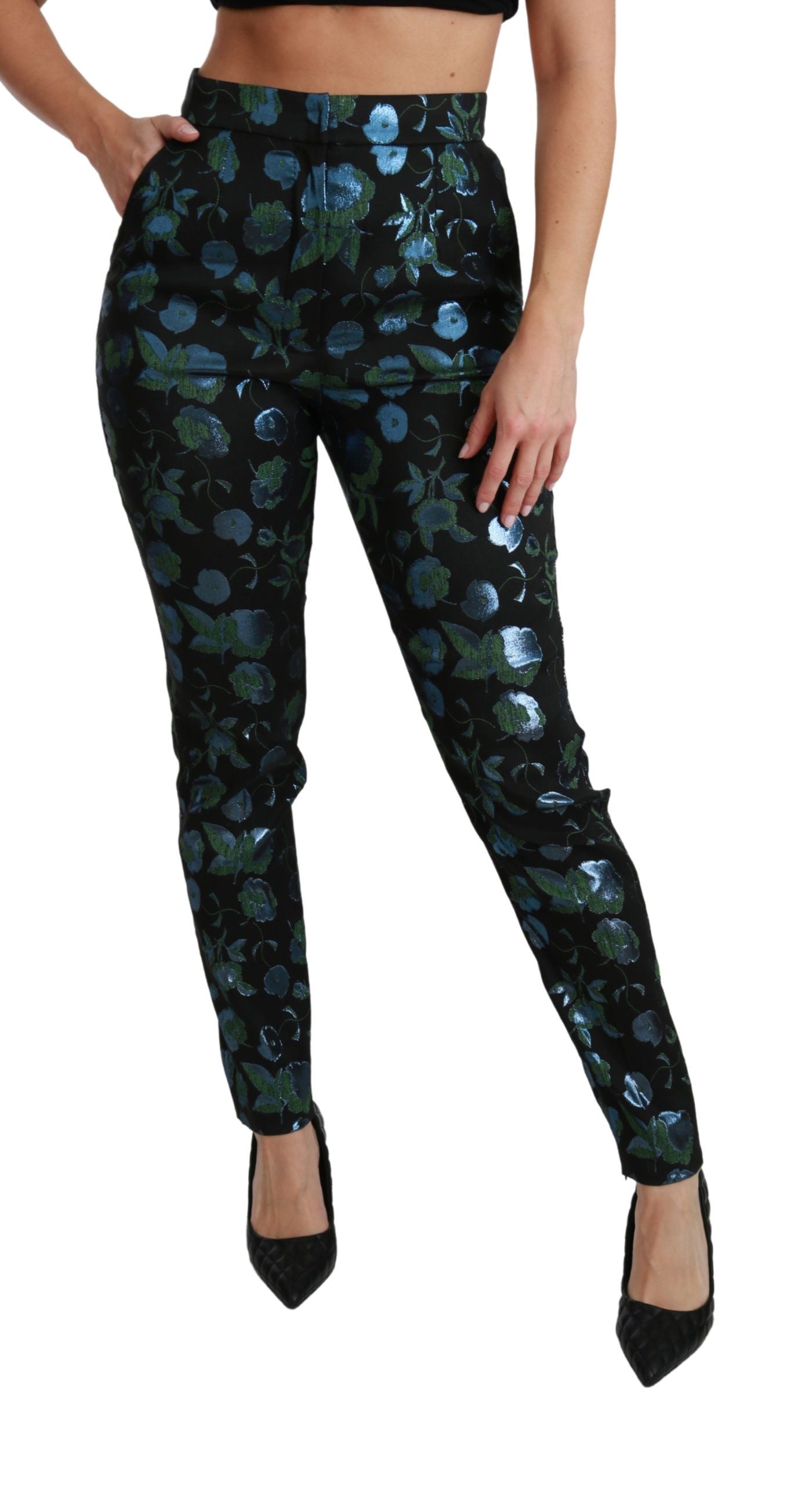 Pantalon slim métallique Dolce & Gabbana bleu vert à fleurs, style élégant et moderne, visible en détail dans cette image.