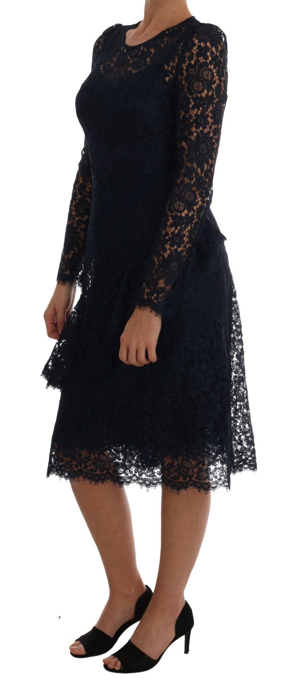 Robe fourreau en dentelle florale bleue Dolce & Gabbana Taormina, détail de la dentelle et coupe élégante visible dans l'image.