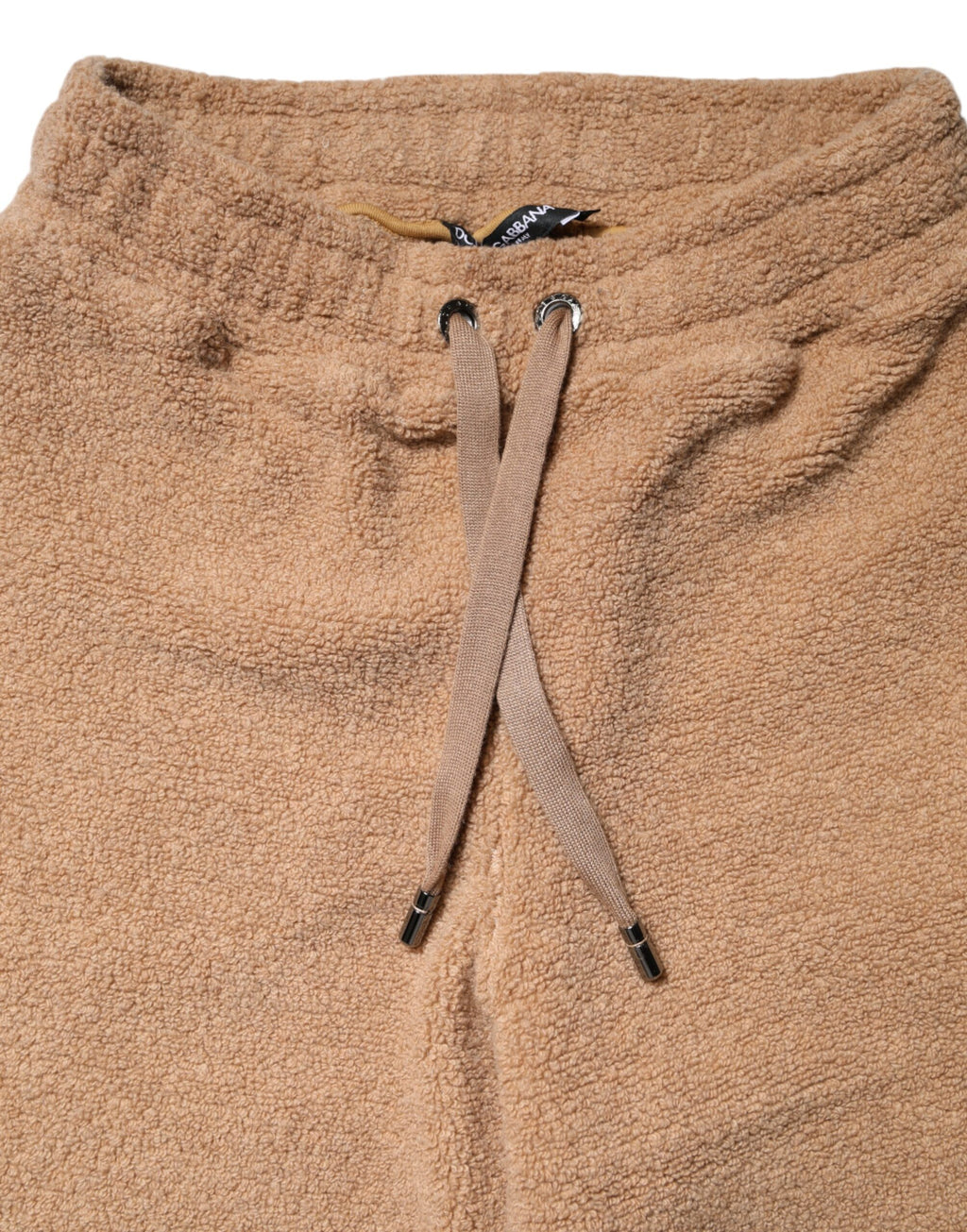 Pantalon droit Dolce & Gabbana en molleton marron avec logo en plaque, style décontracté et élégant.